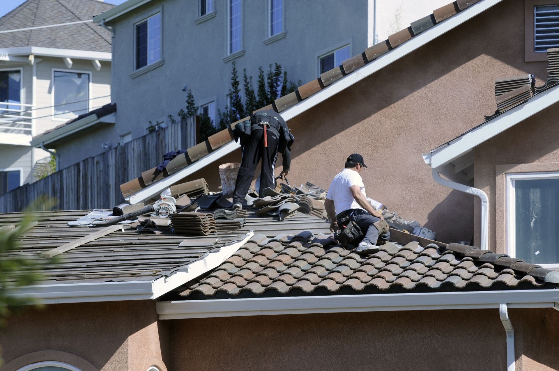 bigstock-Hispanic-Roofer-Laying-Roofing-2837166.jpg