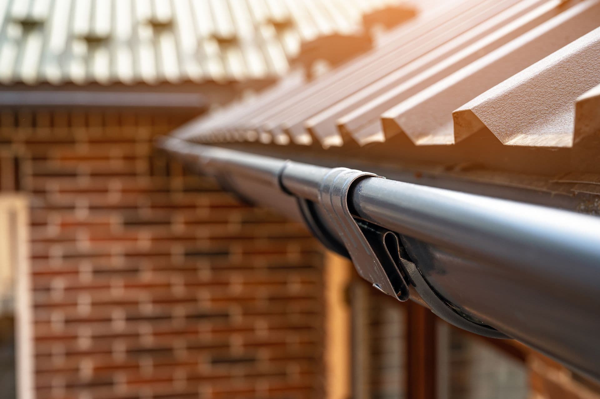 bigstock--Gutter-System-For-A-Metal-Ro-370893808.jpg